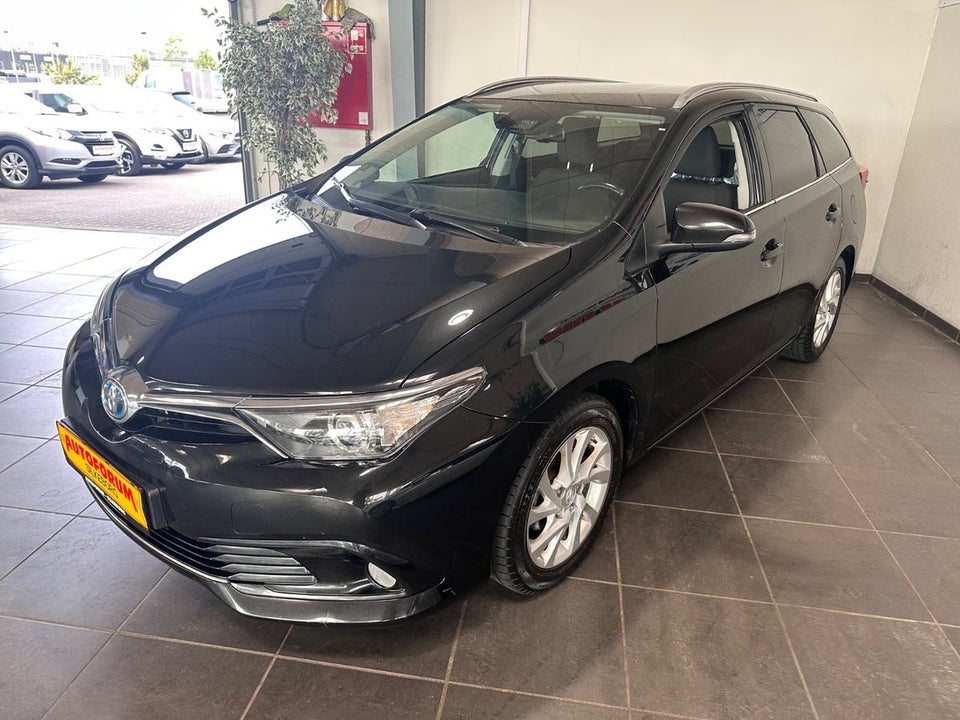 Toyota Auris 1,8 Hybrid H2 Comfort Touring Sports CVT Van 5d