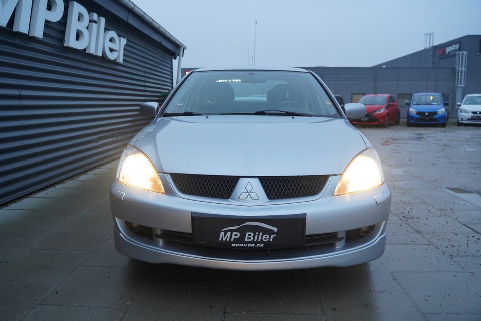 Mitsubishi Lancer 1,6 Invite 4d