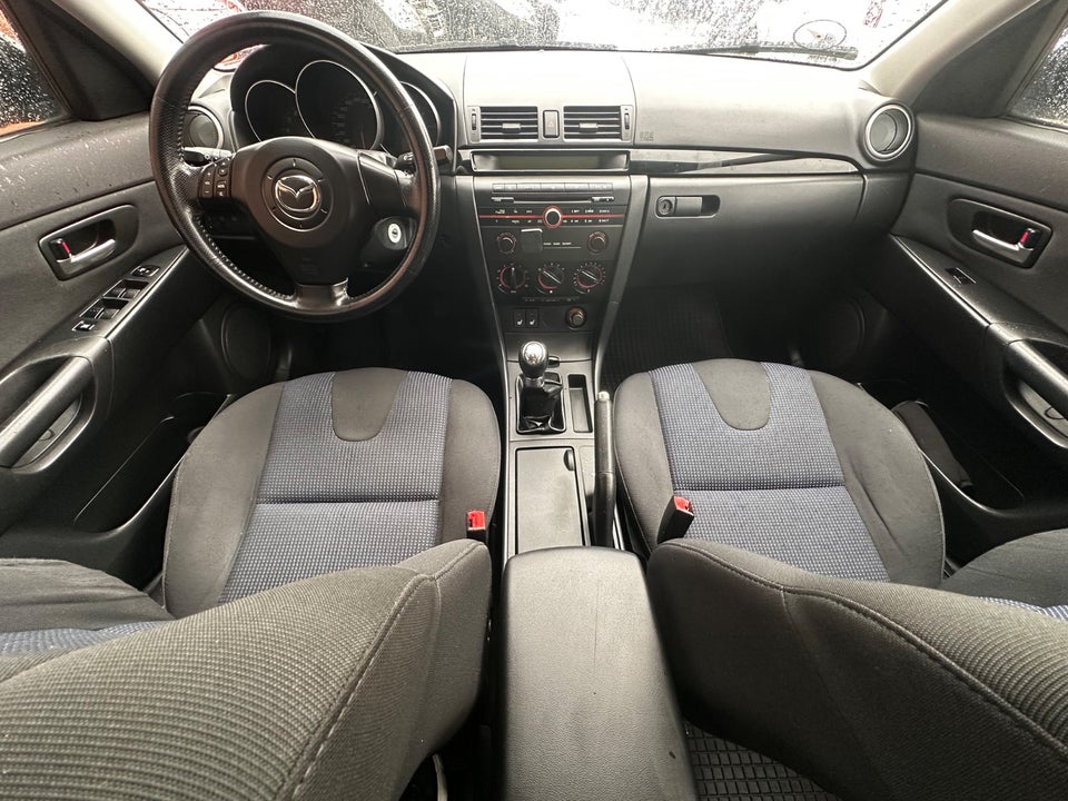 Mazda 3 1,6 Touring 4d