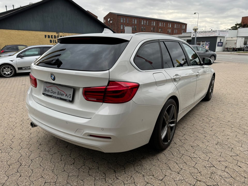 BMW 318i 2,0 Touring Advantage aut. 5d