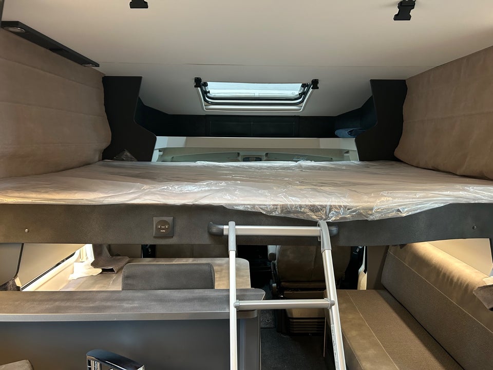 Hobby Optima De Luxe T75 HGE 2,2 aut. 2d