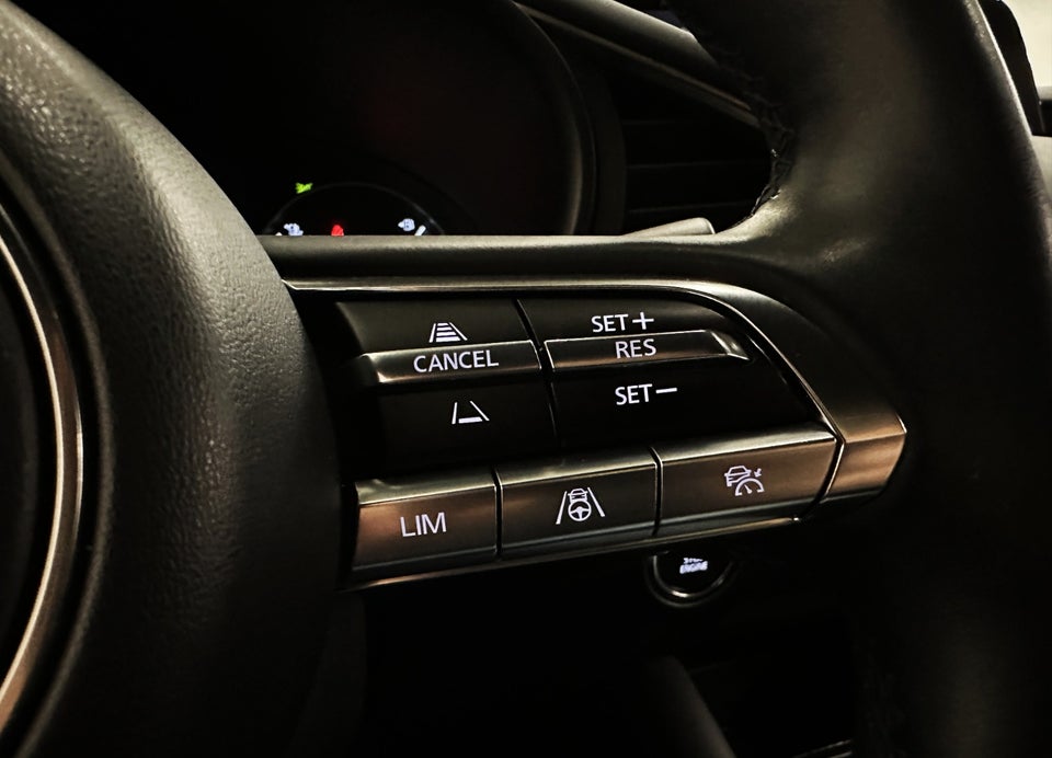 Mazda 3 2,0 SkyActiv-X 180 Cosmo Tech aut. AWD 5d