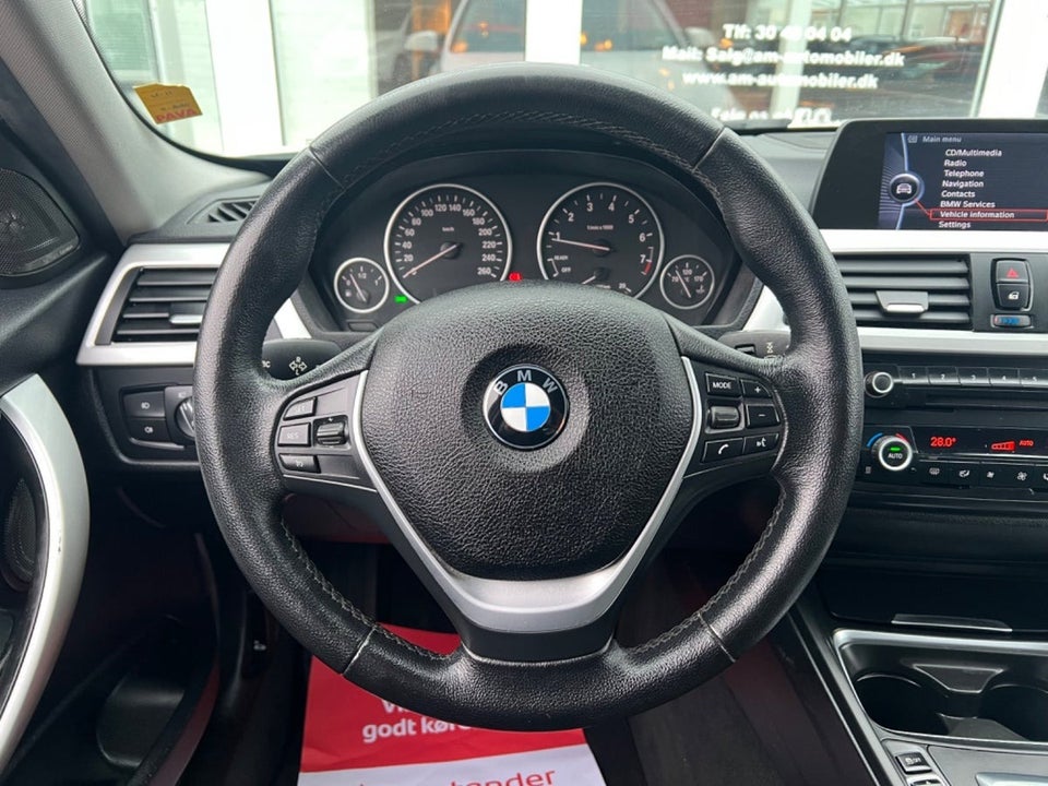 BMW 320i 2,0 aut. 4d