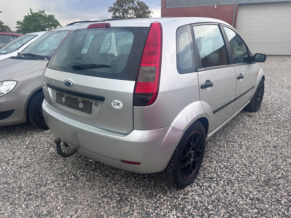 Ford Fiesta 1,4 Ghia aut. 5d