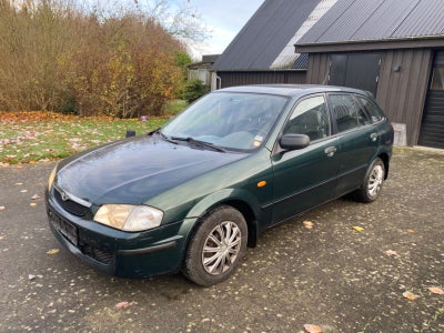 Annonce: Mazda 323 1,3 LX - Pris 12.000 kr.