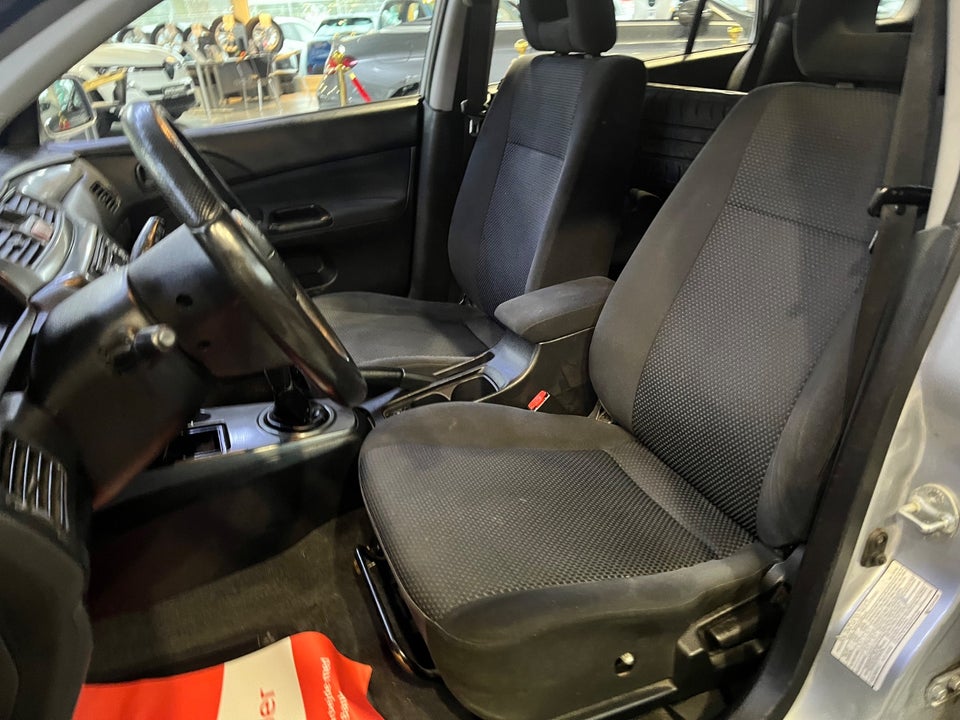 Mitsubishi Lancer 1,6 Comfort stc. 5d