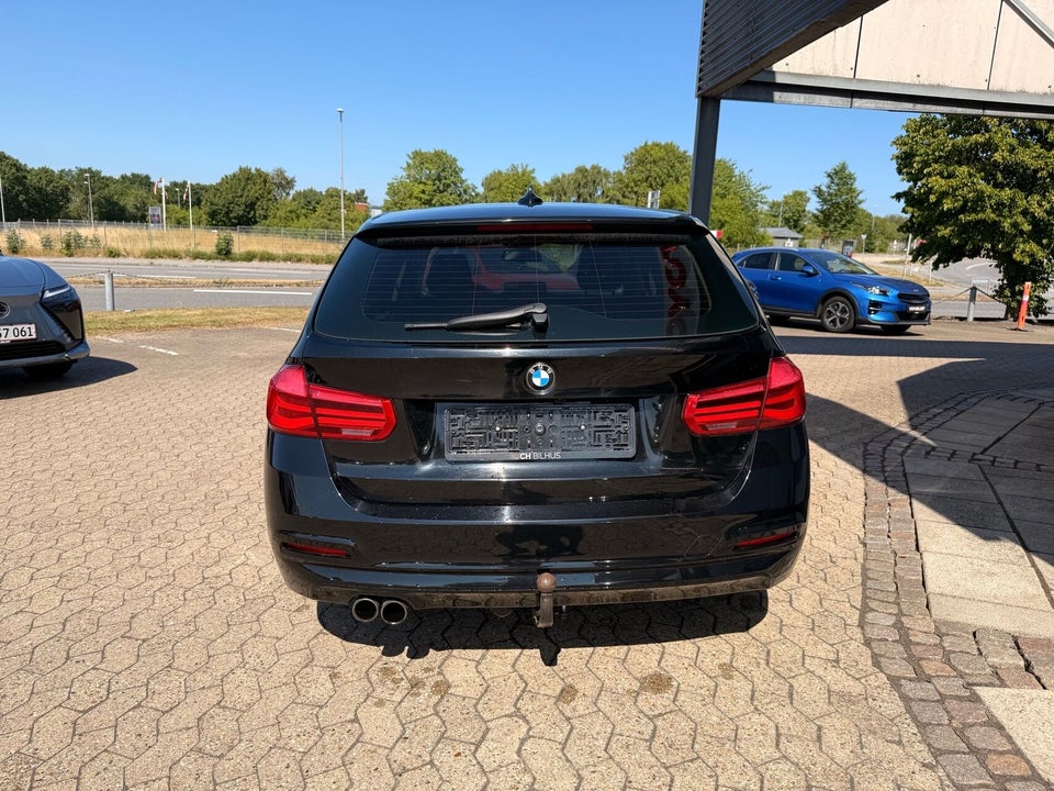 BMW 320i 2,0 Touring aut. 5d