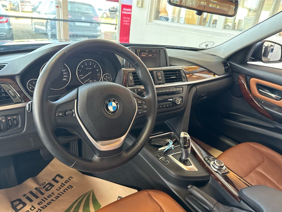BMW 320i 2,0 aut. 4d