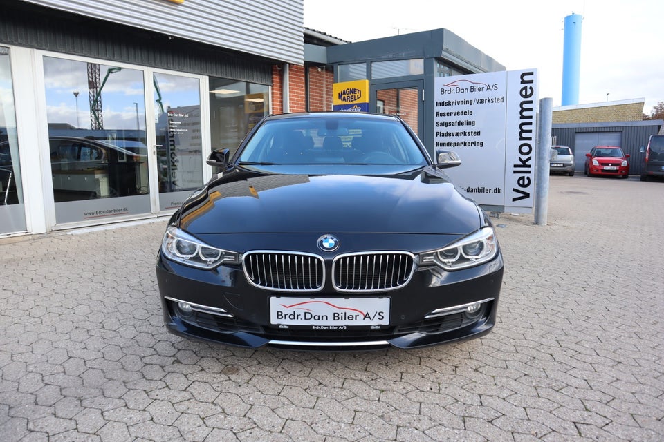 BMW 320i 2,0 aut. 4d