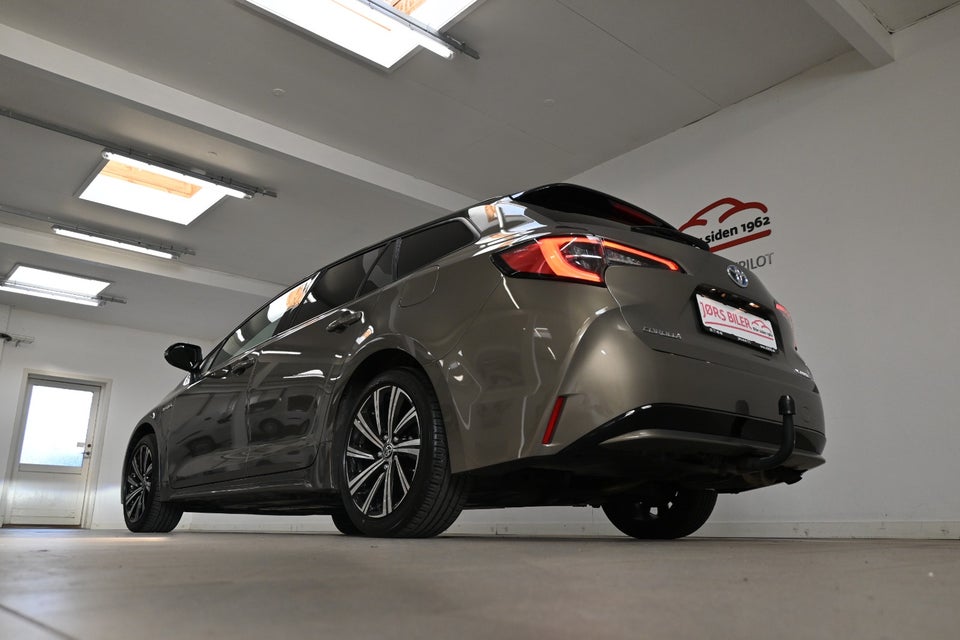 Toyota Corolla 1,8 Hybrid Active Premium Touring Sports MDS 5d