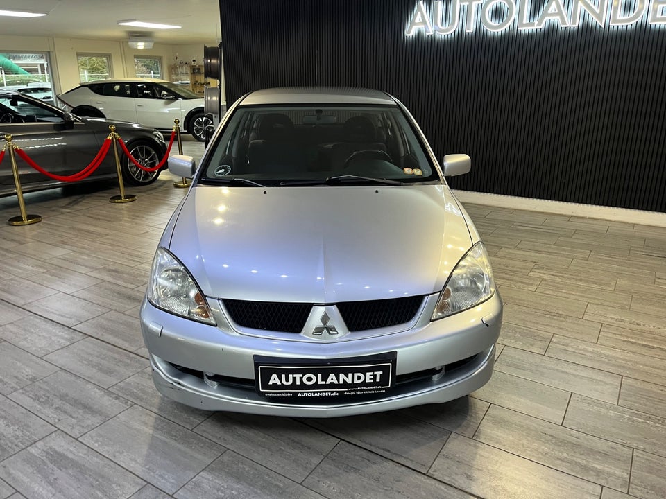 Mitsubishi Lancer 1,6 Comfort stc. 5d