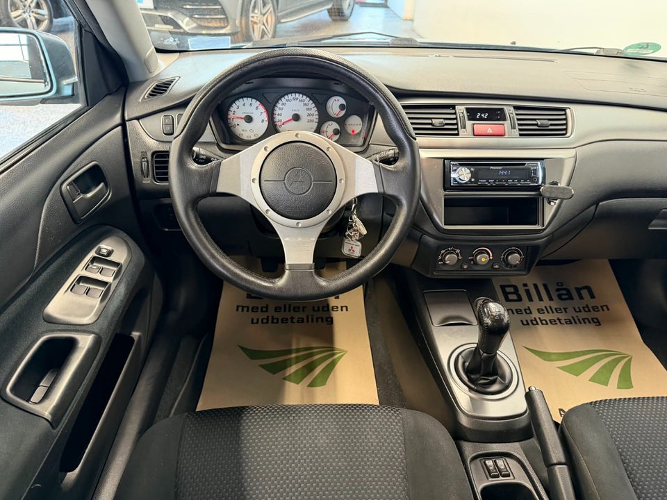 Mitsubishi Lancer 1,6 Comfort stc. 5d