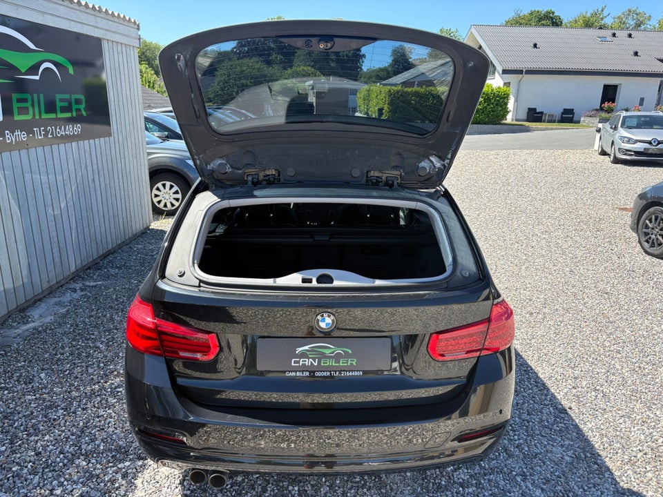 BMW 320i 2,0 Touring aut. 5d