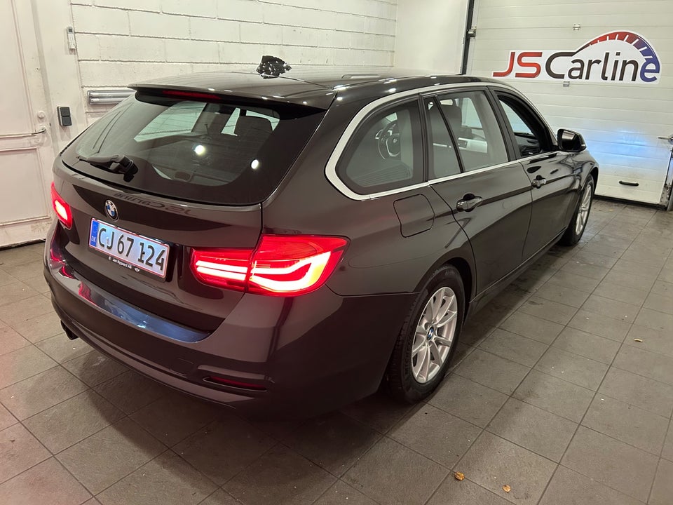 BMW 320i 2,0 Touring aut. 5d