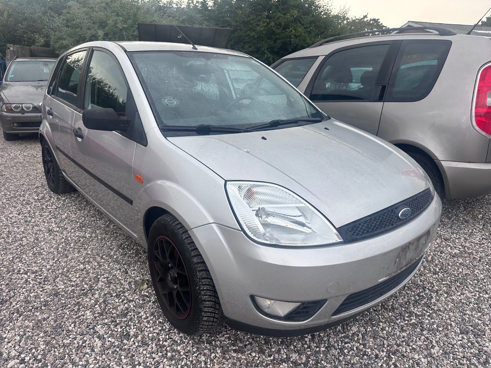 Ford Fiesta 1,4 Ghia aut. 5d