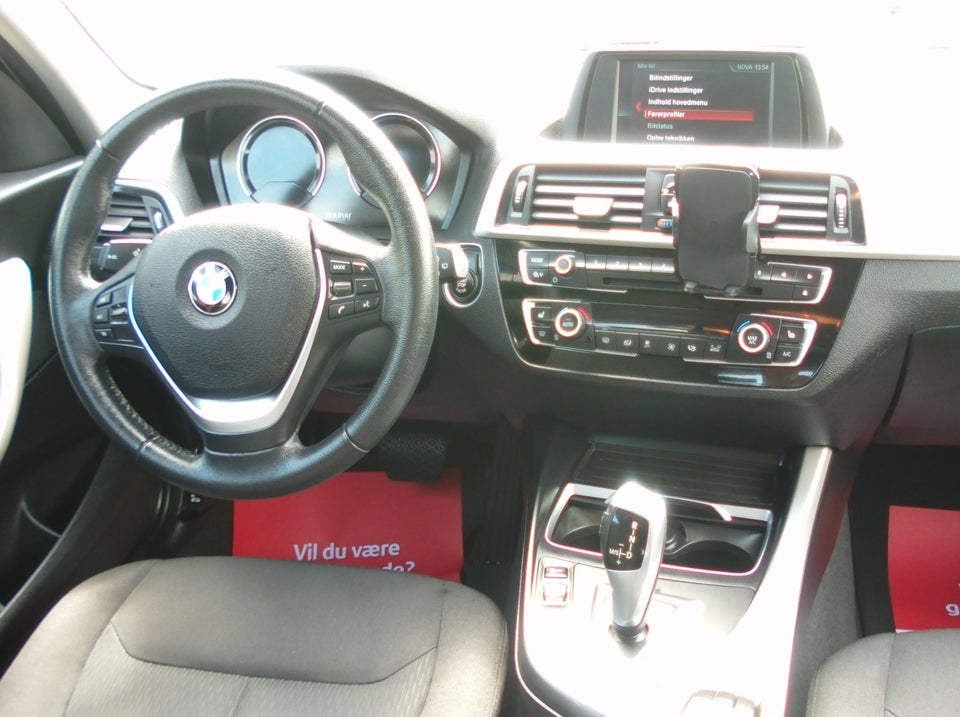BMW 118i 1,5 Advantage aut. 5d