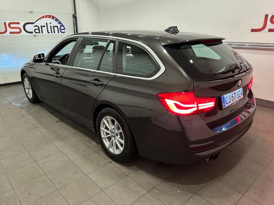 BMW 320i 2,0 Touring aut. 5d