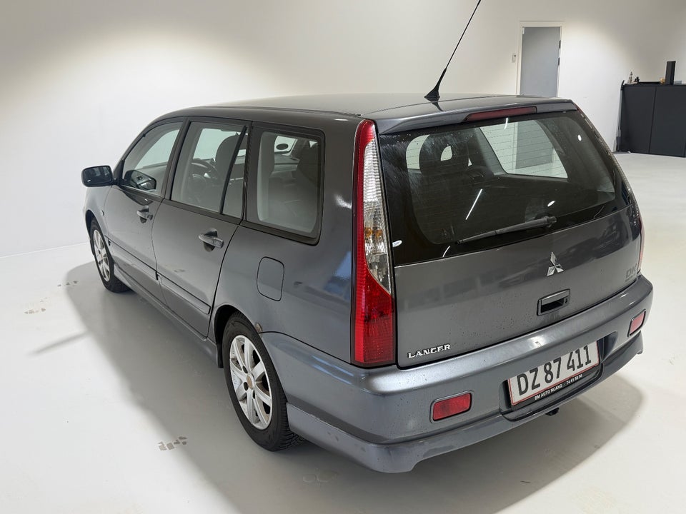 Mitsubishi Lancer 1,6 Invite stc. 5d