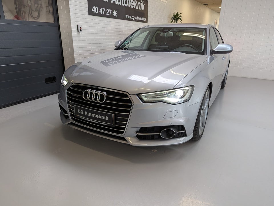 Audi A6 3,0 TDi 218 quattro S-tr. 4d