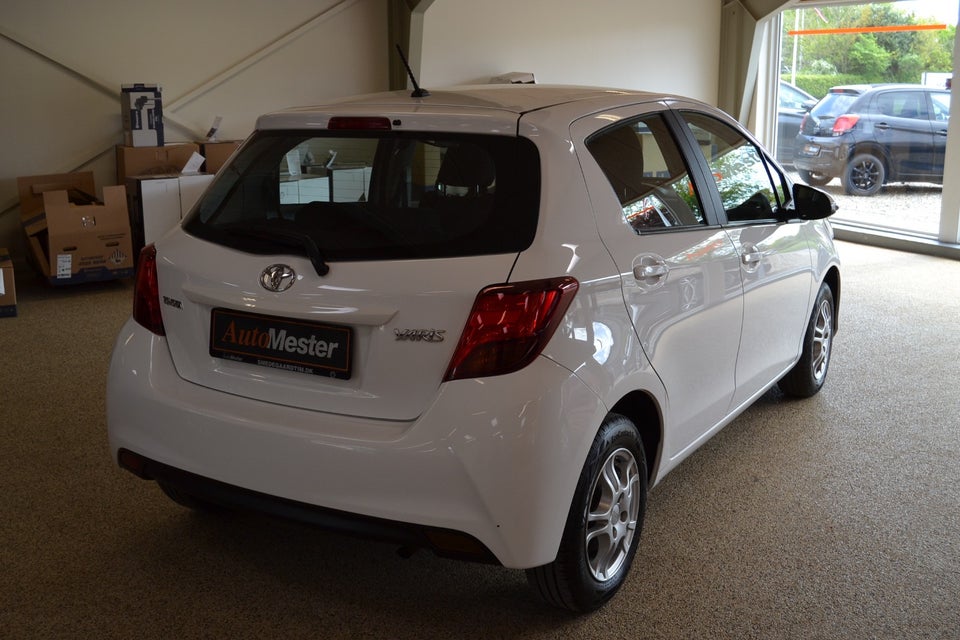 Toyota Yaris 1,0 VVT-i T2 5d