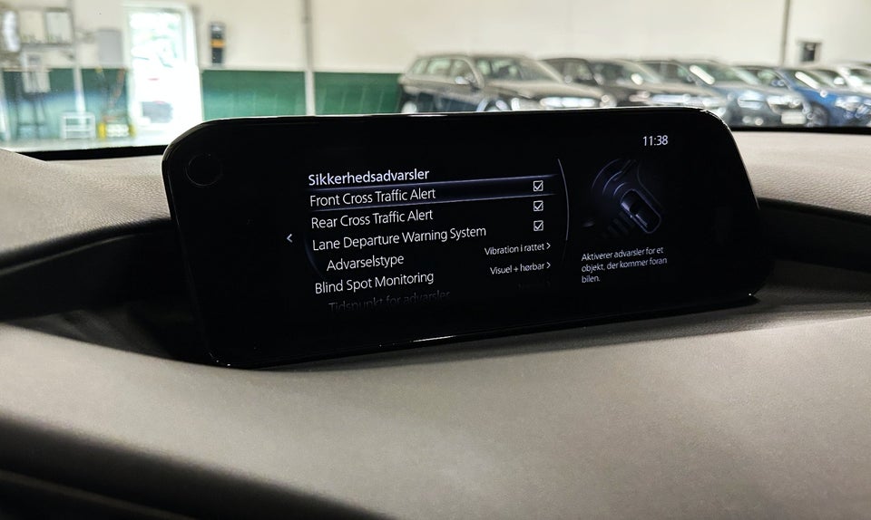 Mazda 3 2,0 SkyActiv-X 180 Cosmo Tech aut. AWD 5d