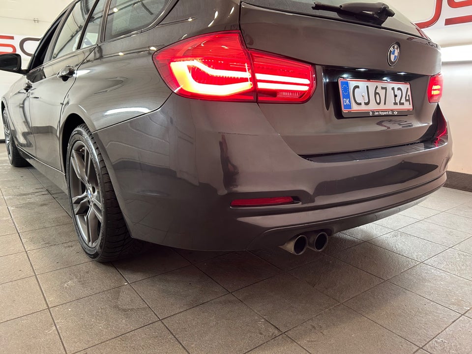 BMW 320i 2,0 Touring aut. 5d