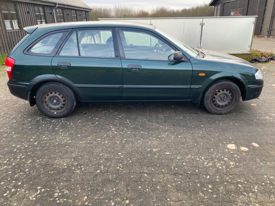 Mazda 323 1,3 LX 4d