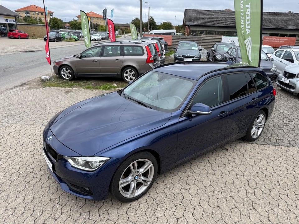 BMW 320i 2,0 Touring aut. 5d