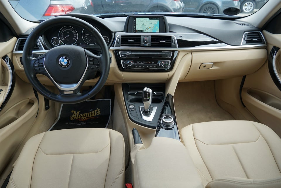 BMW 320i 2,0 aut. 4d