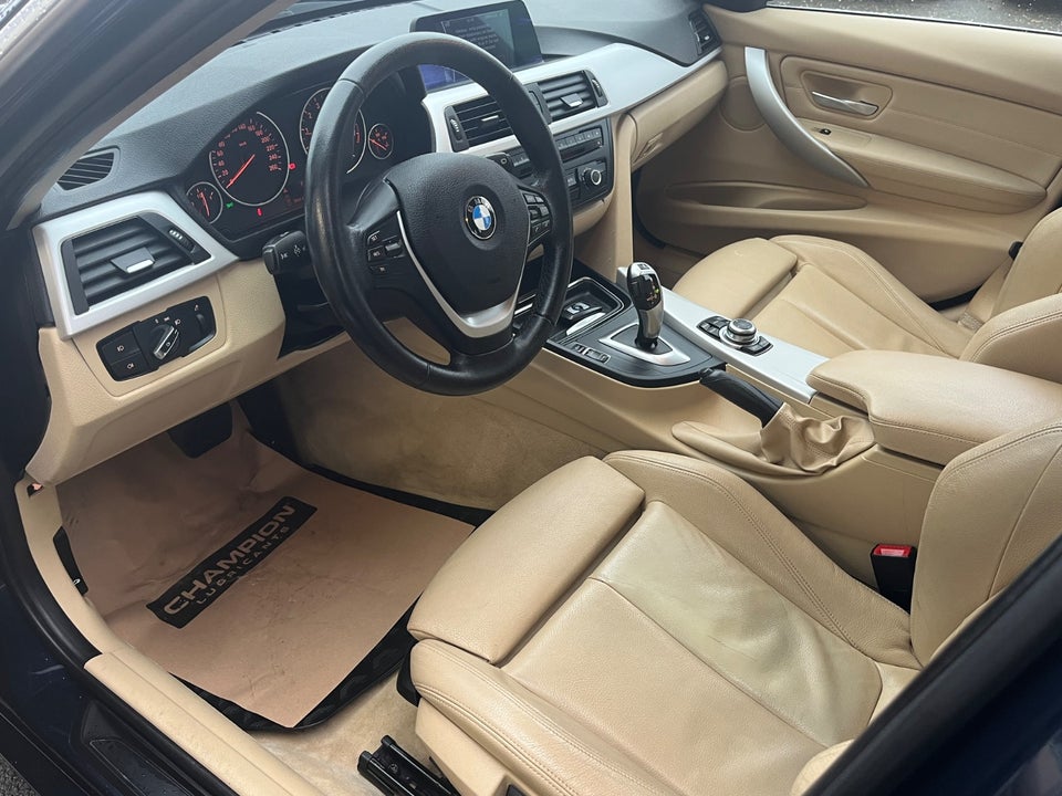 BMW 320i 2,0 Touring aut. 5d