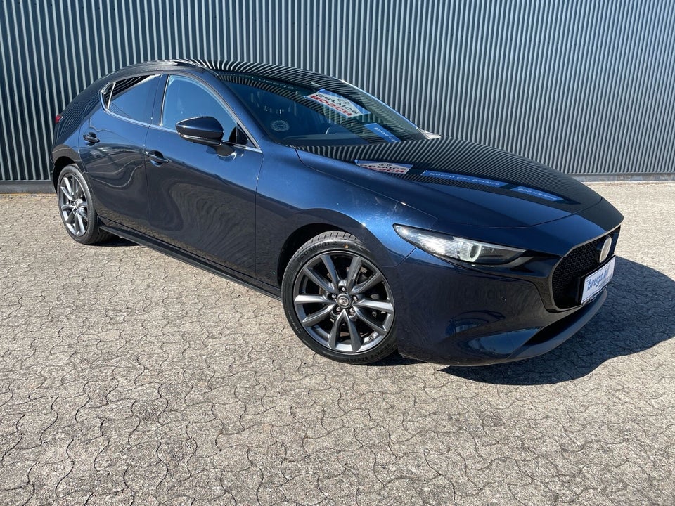 Mazda 3 2,0 SkyActiv-X 180 Cosmo Tech aut. AWD 5d