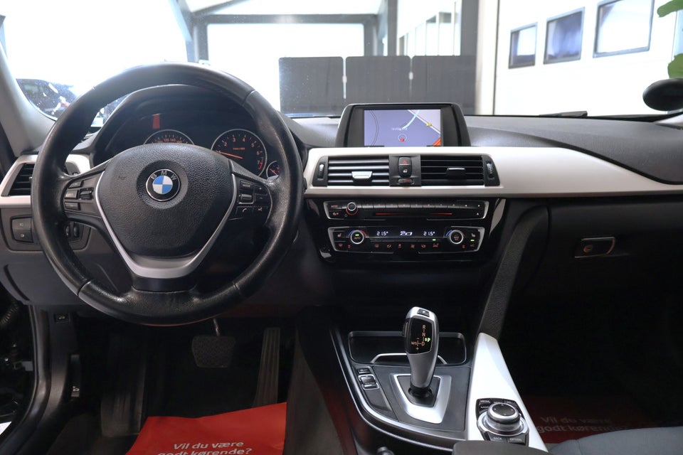 BMW 320i 2,0 Touring aut. 5d