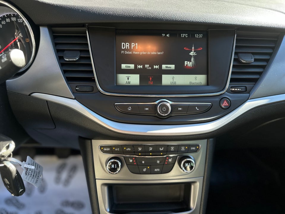 Opel Astra 1,4 T 125 Enjoy Sports Tourer 5d