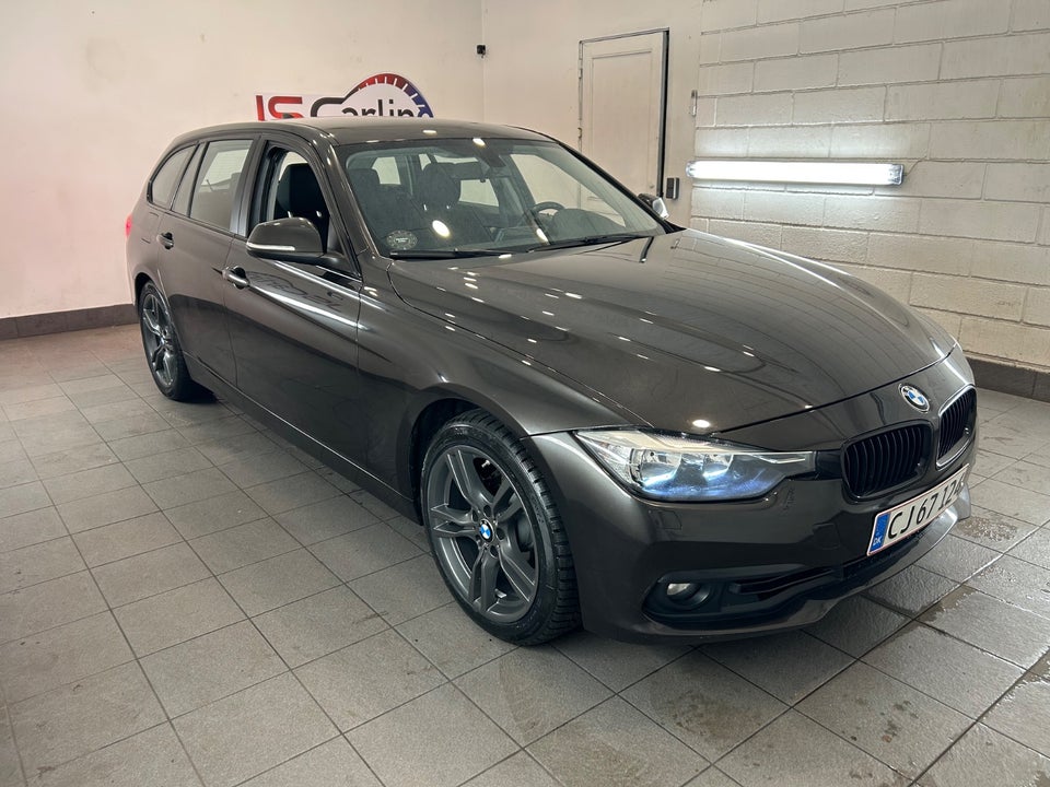 BMW 320i 2,0 Touring aut. 5d