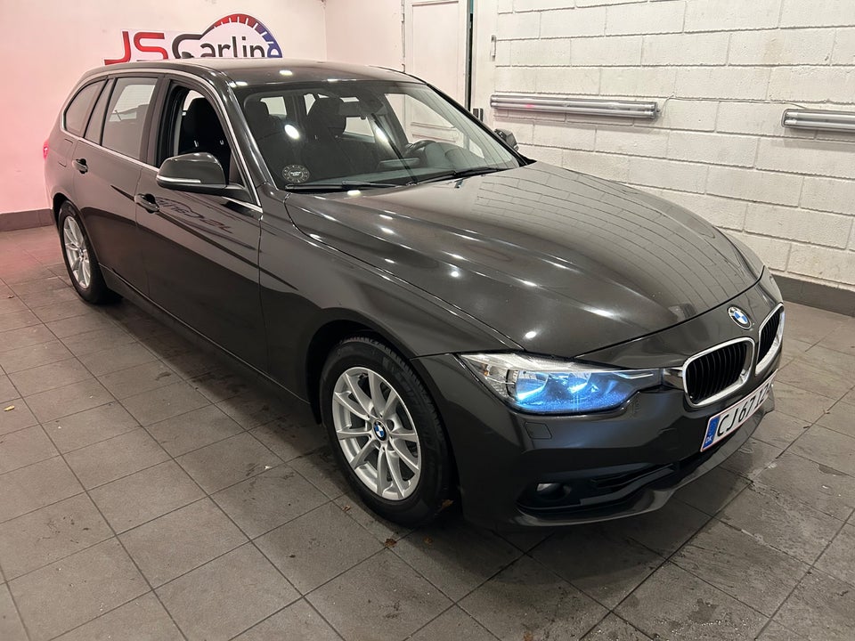 BMW 320i 2,0 Touring aut. 5d