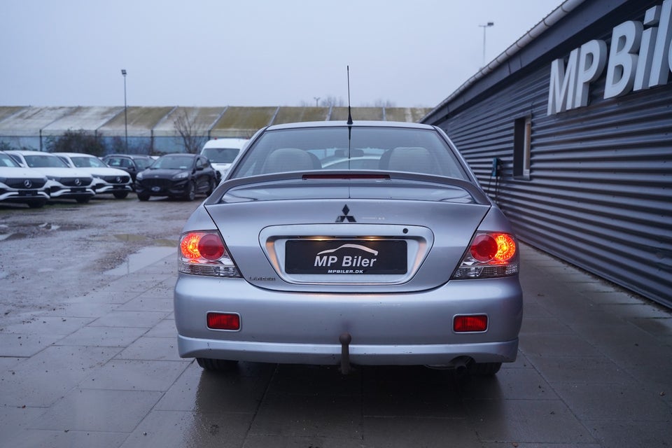 Mitsubishi Lancer 1,6 Invite 4d