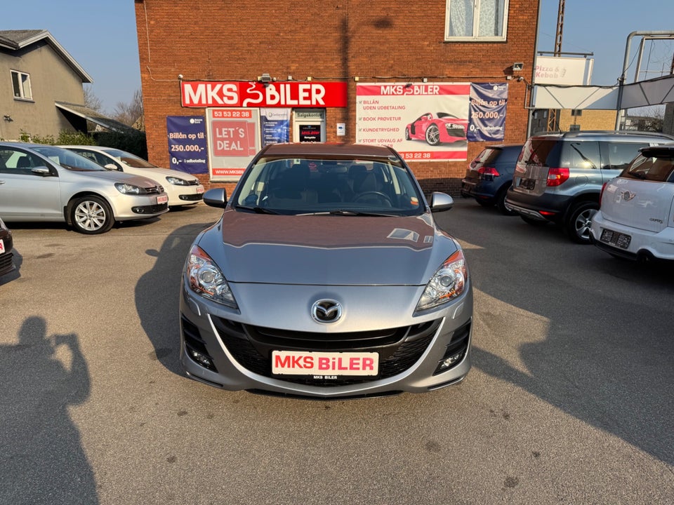 Mazda 3 1,6 DE 115 Premium 4d