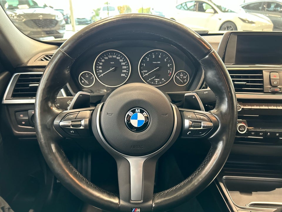 BMW 320i 2,0 aut. 4d