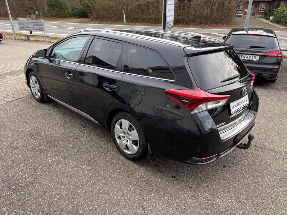 Toyota Auris 1,8 Hybrid H2 Comfort Touring Sports CVT 5d