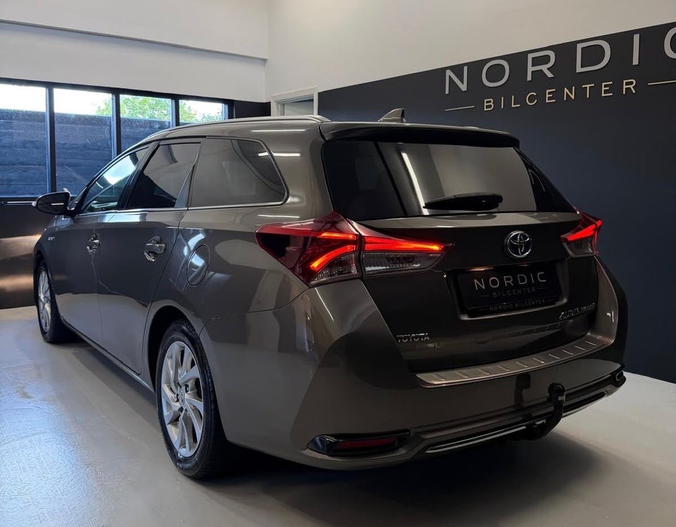 Toyota Auris 1,8 Hybrid H2 Comfort Touring Sports CVT 5d