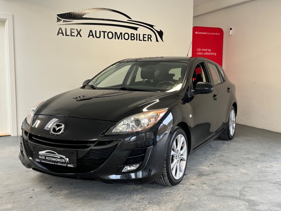 Mazda 3 1,6 DE 115 Premium 4d