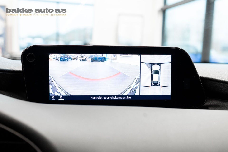 Mazda 3 2,0 e-SkyActiv-G 150 Cosmo Tech aut. 4d