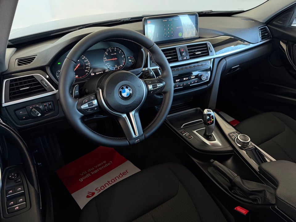BMW 320i 2,0 Advantage aut. 4d