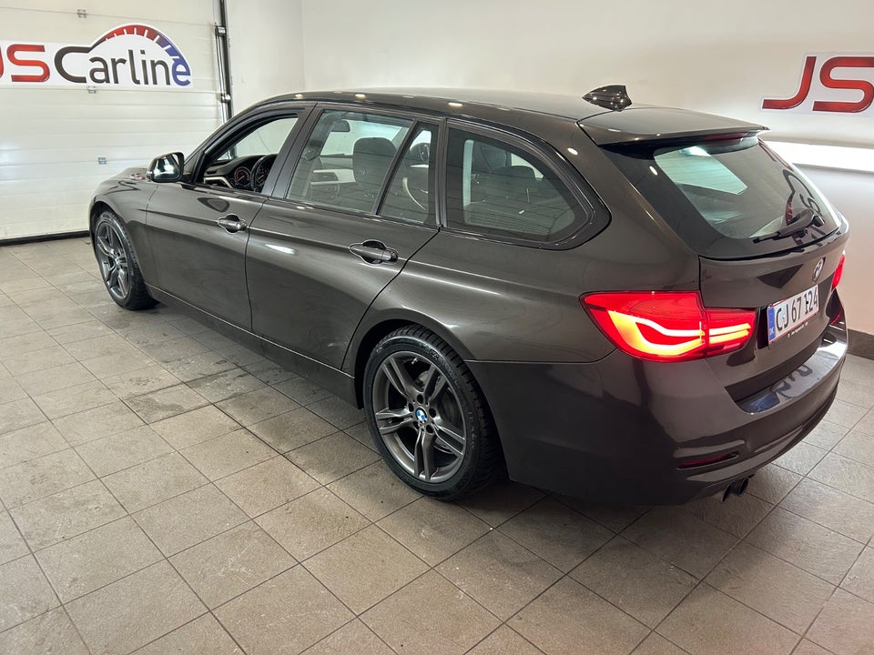 BMW 320i 2,0 Touring aut. 5d