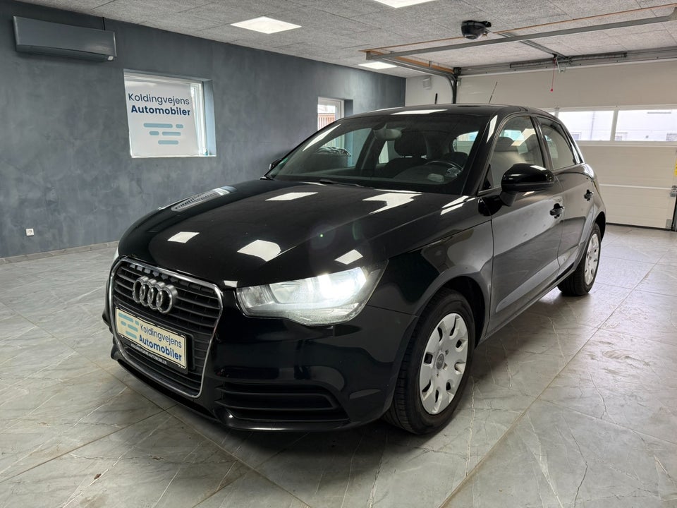 Audi A1 1,6 TDi 90 Attraction 3d