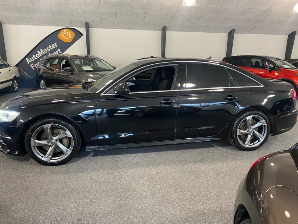 Audi A6 3,0 TDi 218 S-tr. 4d