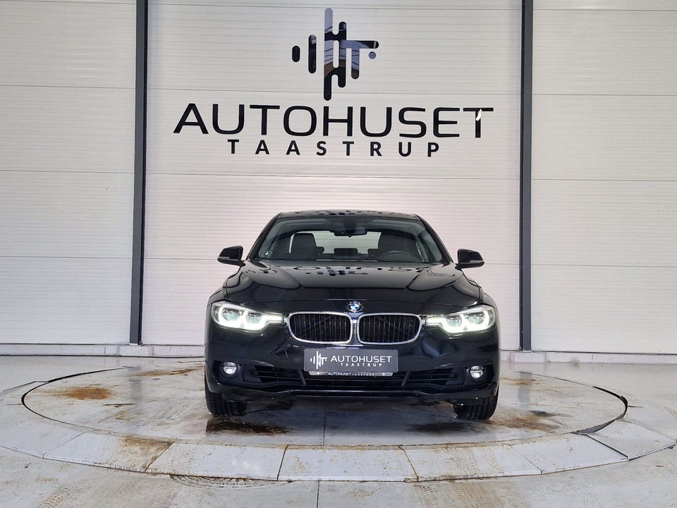 BMW 320i 2,0 Advantage aut. 4d