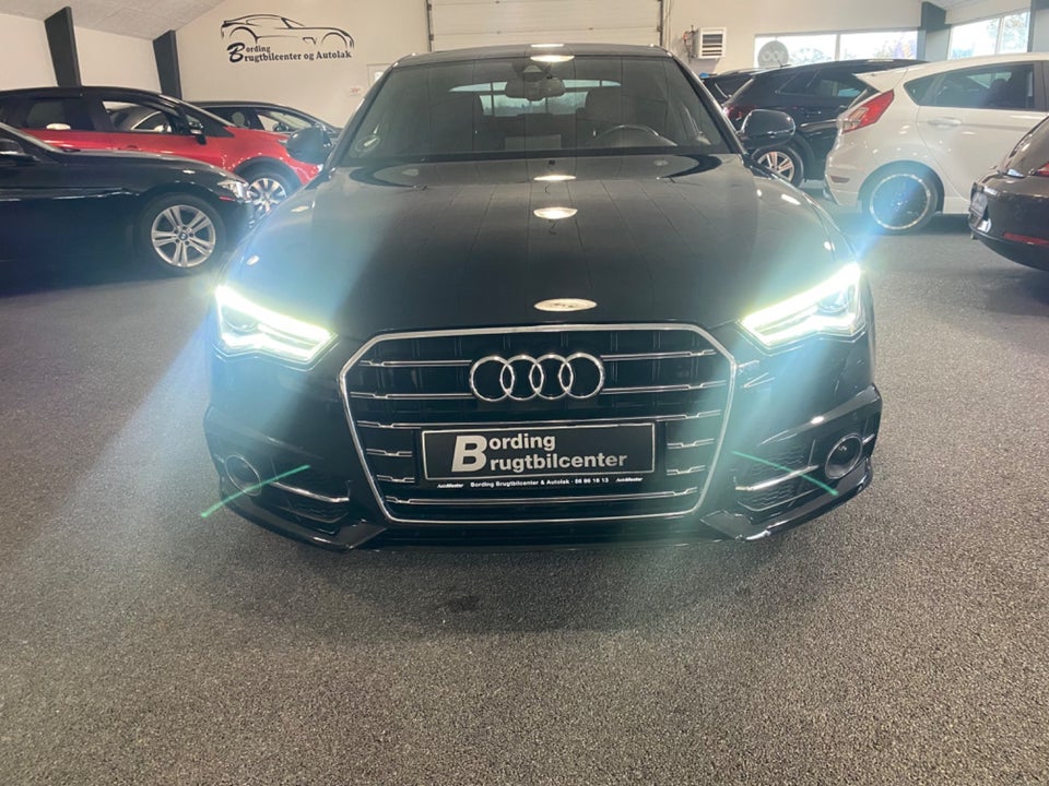 Audi A6 3,0 TDi 218 S-tr. 4d