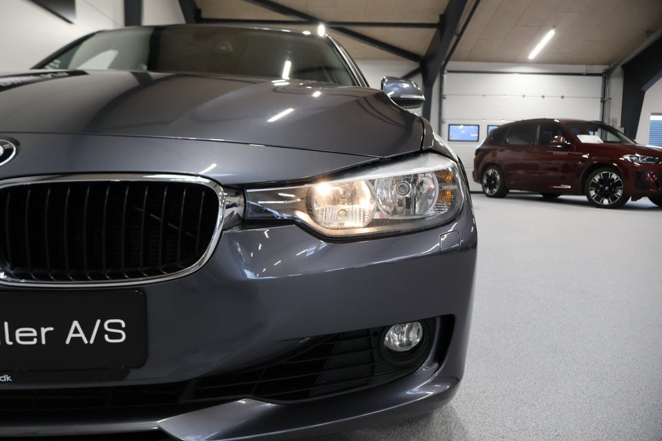 BMW 320i 2,0 Touring aut. 5d