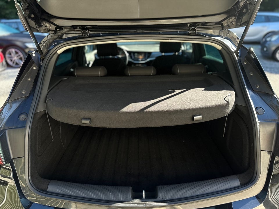 Opel Astra 1,4 T 125 Enjoy Sports Tourer 5d